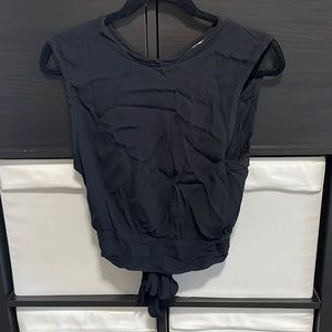 Open back, tie back, black tank top. Super cute for summer!